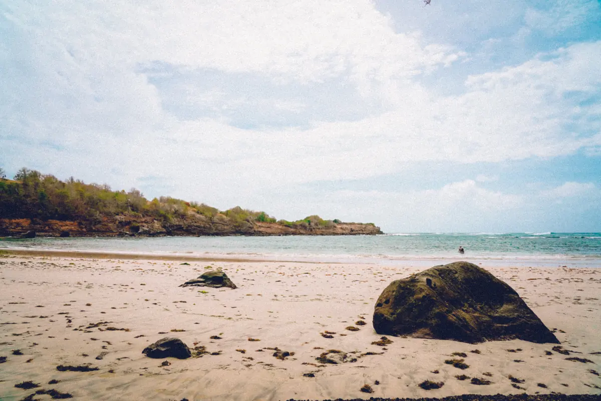 Dark volcanic boulders along Grenada's rugged eastern shoreline