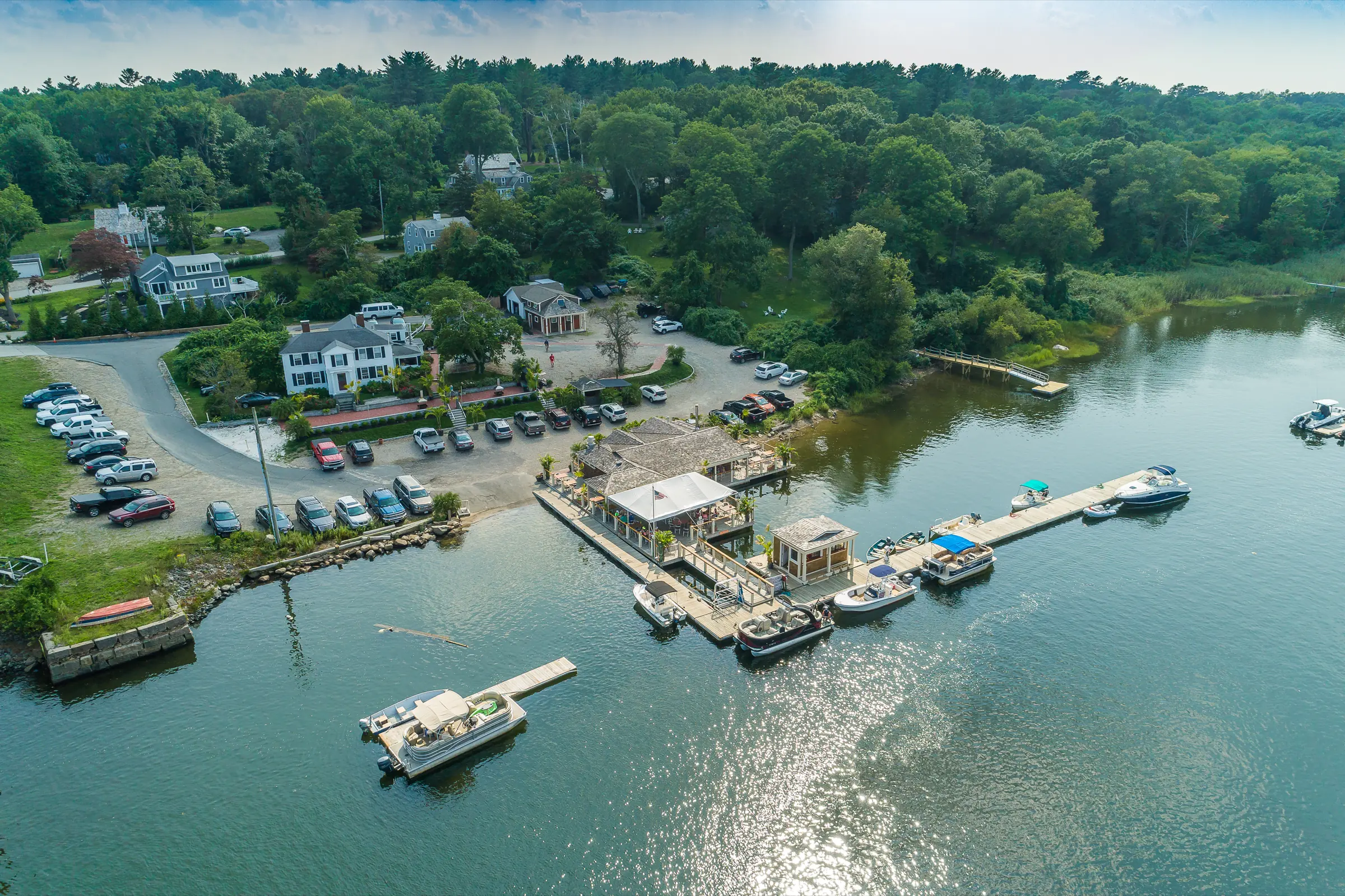 Aerial view of Roht Marine's docks and moored boats at Green Harbor